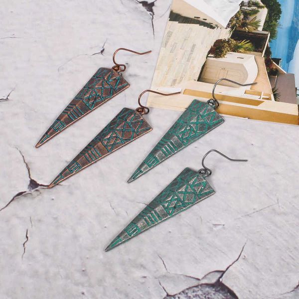 earring bohemian folk triangle irregular old totem carving earrings, Golden
earring bohemian folk triangle irregular old totem carving earrings, Golden