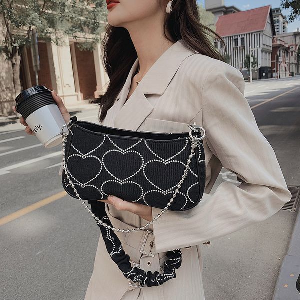 autumn and winter new lovely heart embroidery chain women's fashion canvas armpit bag single shoulder messenger hand
autumn and winter new lovely heart embroidery chain women's fashion canvas armpit bag single shoulder messenger hand