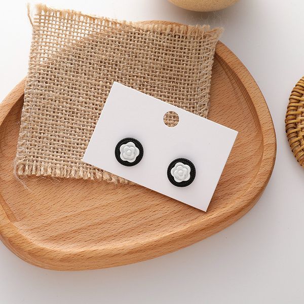 korean lovely camellia flower earrings female fashion temperament black and white students simple, Silver
korean lovely camellia flower earrings female fashion temperament black and white students simple, Silver