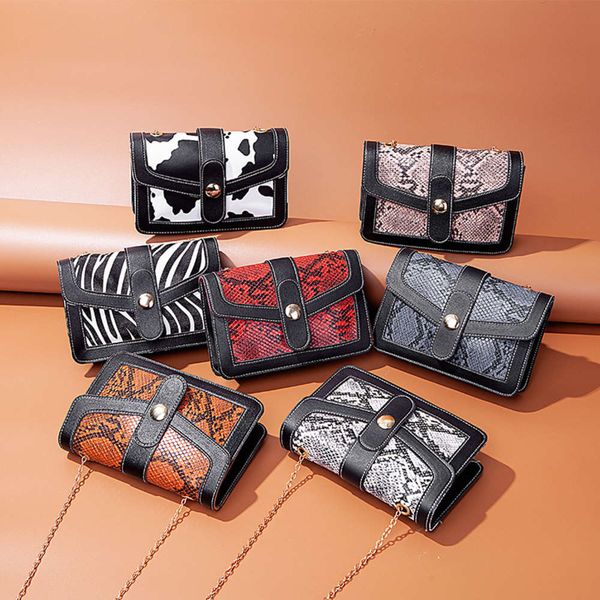 ladies 2021 winter wind snake pattern color contrast chain small square single shoulder messenger mobile bag women's fashion
ladies 2021 winter wind snake pattern color contrast chain small square single shoulder messenger mobile bag women's fashion