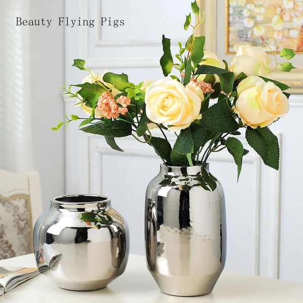 home living room tv cabinet wine cabinet gold decorative ornaments vase simple creative silver flower flower inserter soft art
home living room tv cabinet wine cabinet gold decorative ornaments vase simple creative silver flower flower inserter soft art