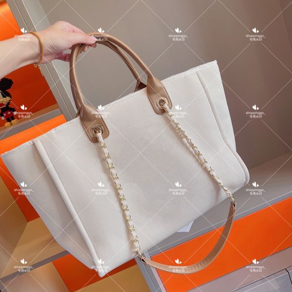 2021 fashion luxury large size pearl beach bags canvas with leather shopping bag wallet letter embroidery women handbag classic designer sho 
2021 fashion luxury large size pearl beach bags canvas with leather shopping bag wallet letter embroidery women handbag classic designer sho