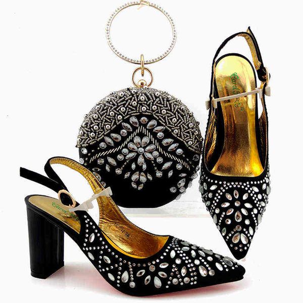 round dinner bag hand bag with pointed buckle high heels fashion sandals shoe set, Black
round dinner bag hand bag with pointed buckle high heels fashion sandals shoe set, Black