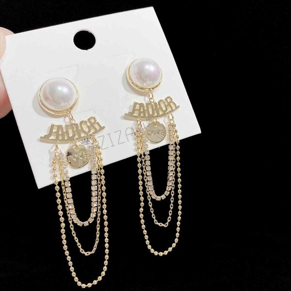 2021 new designer zizan letter earrings tassel female korean advanced temperament pearl silver needles, Golden
2021 new designer zizan letter earrings tassel female korean advanced temperament pearl silver needles, Golden