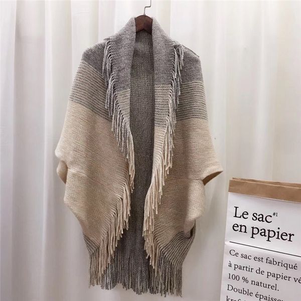 autumn winter women's wear version gradient stripe loose tassel shawl coat golden bat sleeve sweater, Blue;gray
autumn winter women's wear version gradient stripe loose tassel shawl coat golden bat sleeve sweater, Blue;gray