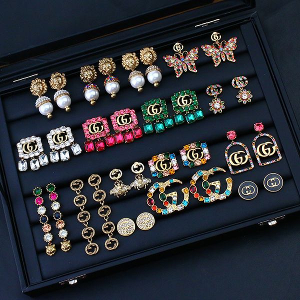 family new fashion color diamond earrings lion head pearl net red same double earrings female, Golden
family new fashion color diamond earrings lion head pearl net red same double earrings female, Golden