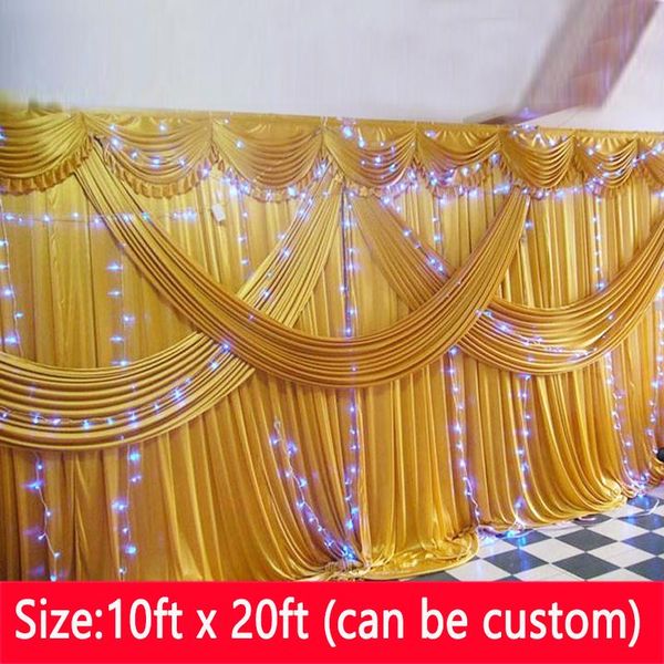 party decoration 20ft (w) x 10ft (h) gold ice silk wedding backdrops with swag stage background event drape and curtain
party decoration 20ft (w) x 10ft (h) gold ice silk wedding backdrops with swag stage background event drape and curtain