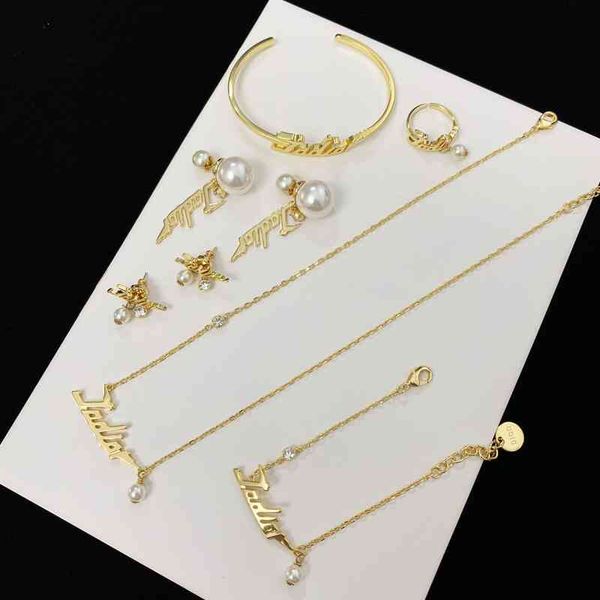 factory wholesale earrings pearl letters earrings female brass high version bracelet necklace open ring bracelet, Silver
factory wholesale earrings pearl letters earrings female brass high version bracelet necklace open ring bracelet, Silver