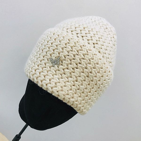 2021 women winter solid color beanies matched new sequined knitted hat warm with butterfly decoration female cap 33av, Blue;gray
2021 women winter solid color beanies matched new sequined knitted hat warm with butterfly decoration female cap 33av, Blue;gray