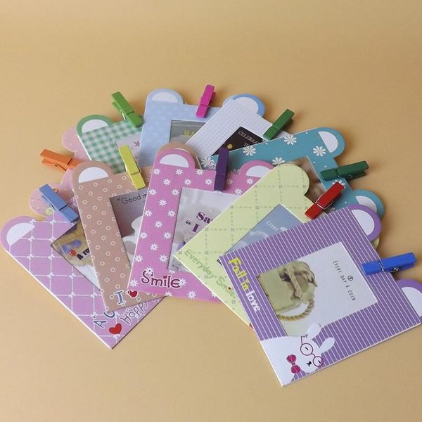 frames po 10 pcs/lot 3 inch diy wall hanging paper frame for picture emoticons with wooden clip hanger rope
frames po 10 pcs/lot 3 inch diy wall hanging paper frame for picture emoticons with wooden clip hanger rope
