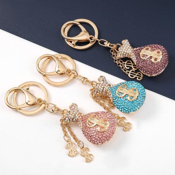 keychains fashion metal rhinestone dollar sign money bag keychain female backpack pendant campus accessories, Silver 
keychains fashion metal rhinestone dollar sign money bag keychain female backpack pendant campus accessories, Silver