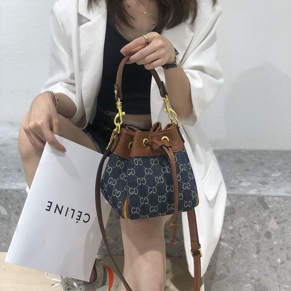 factory outlet bag women's bag new fashion bucket autumn and winter trend denim printed diagonal shoulder
factory outlet bag women's bag new fashion bucket autumn and winter trend denim printed diagonal shoulder