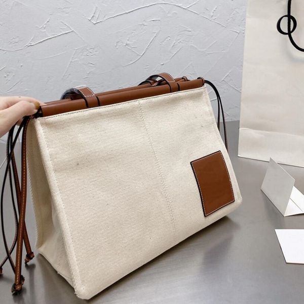 large capacity shopping bags temperament women handbags canvas geometric shoulder bagss fashion totes long shoulder strap high quality
large capacity shopping bags temperament women handbags canvas geometric shoulder bagss fashion totes long shoulder strap high quality