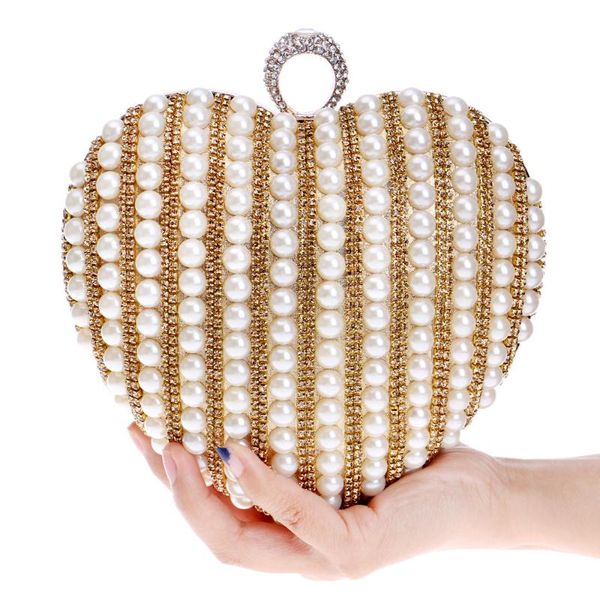 evening bags european and american fashion pearl heart dinner bag exquisite bridal banquet dress hand lady messenger
evening bags european and american fashion pearl heart dinner bag exquisite bridal banquet dress hand lady messenger