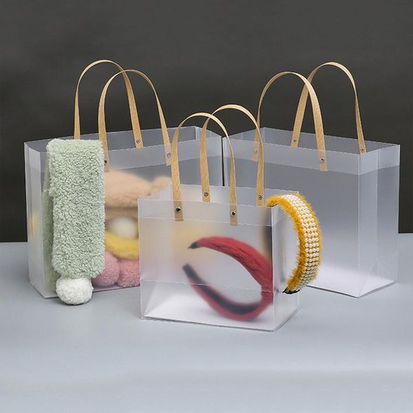 transparent plastic bags frosted pp bags with paper handle for packaging gift candy flower xmas gifts storage package
transparent plastic bags frosted pp bags with paper handle for packaging gift candy flower xmas gifts storage package