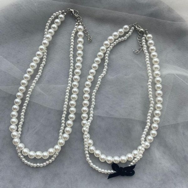 chokers vintage elegant double-layer imitation pearl black bowknot temperament handmade beaded necklace for women clavicle chain jewelry, Golden;silver
chokers vintage elegant double-layer imitation pearl black bowknot temperament handmade beaded necklace for women clavicle chain jewelry, Golden;silver