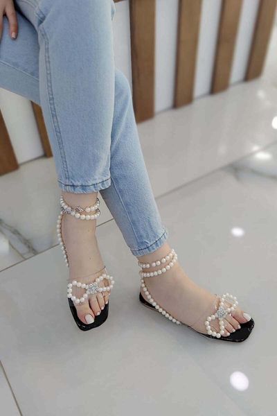 sandals terra wrist gusset pearl detail transparent female black
sandals terra wrist gusset pearl detail transparent female black