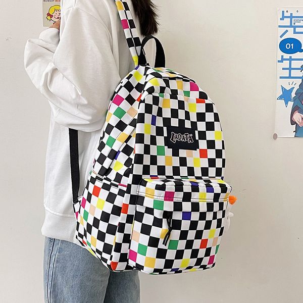 new style chessboard plaid backpack korean simple ins artistic style large capacity schoolbag.
new style chessboard plaid backpack korean simple ins artistic style large capacity schoolbag.