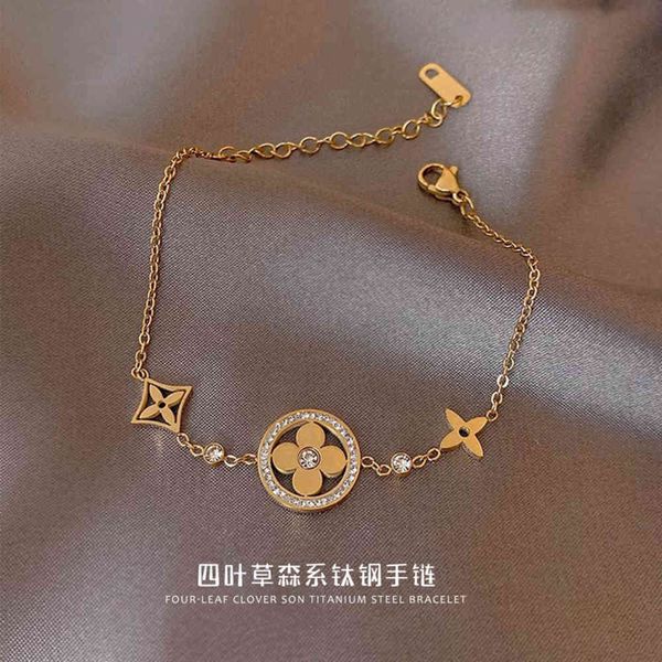 bracelet clover lucky grass titanium steel bracelet female hollowed out inlaid forest fashion jewelry, Golden;silver
bracelet clover lucky grass titanium steel bracelet female hollowed out inlaid forest fashion jewelry, Golden;silver