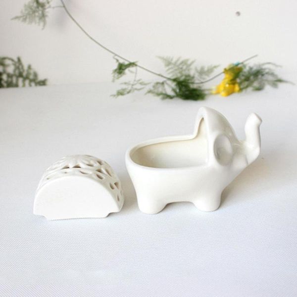 candle holders 2pcs ceamic hollow elephant craft holder windproof animal design tealight stand deskornament for wedding party home d
candle holders 2pcs ceamic hollow elephant craft holder windproof animal design tealight stand deskornament for wedding party home d