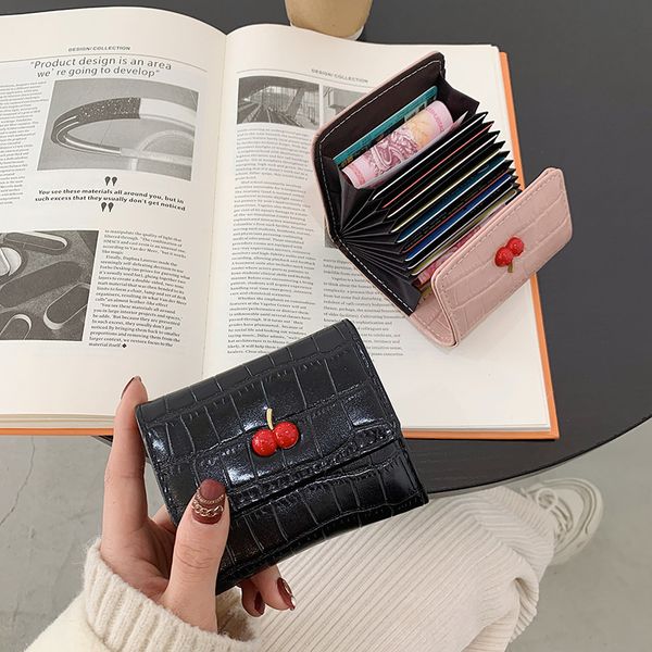 2021 small wallet women's short buckle multi card position three fold simple student bag change, Red;black
2021 small wallet women's short buckle multi card position three fold simple student bag change, Red;black