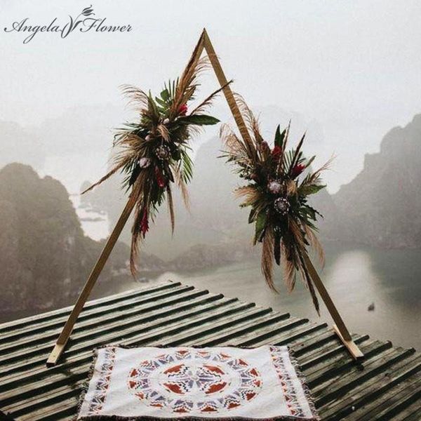 party decoration wrought iron triangle shelf wedding arch geometric shaped backdrop stand decor artificial flower stage layout
party decoration wrought iron triangle shelf wedding arch geometric shaped backdrop stand decor artificial flower stage layout