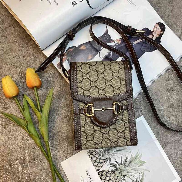 designer handbag 2021 net red new mini mobile phone printed letter messenger single shoulder bag old flower horse clasp
designer handbag 2021 net red new mini mobile phone printed letter messenger single shoulder bag old flower horse clasp