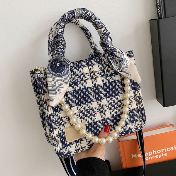 factory direct sale 75% off women 2021 new checked messenger single shoulder women's ins minority tote bags
factory direct sale 75% off women 2021 new checked messenger single shoulder women's ins minority tote bags