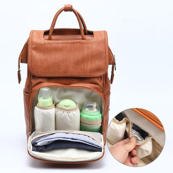 xiaomujin diaper bags pu leather baby bag backpack+changing pad+stroller straps maternity born back pack
xiaomujin diaper bags pu leather baby bag backpack+changing pad+stroller straps maternity born back pack