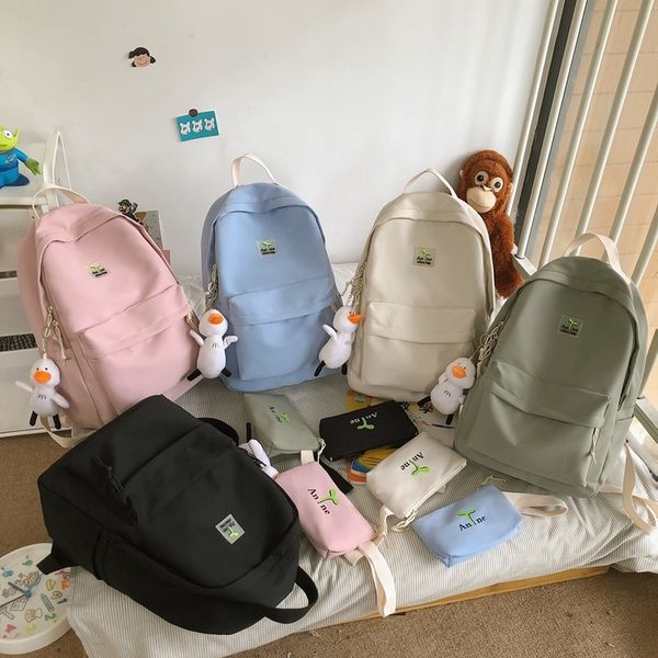 fashion women's backpack cute pendant solid color school bag for girls nylon large capacity waterproof bookpack mini handbags
fashion women's backpack cute pendant solid color school bag for girls nylon large capacity waterproof bookpack mini handbags