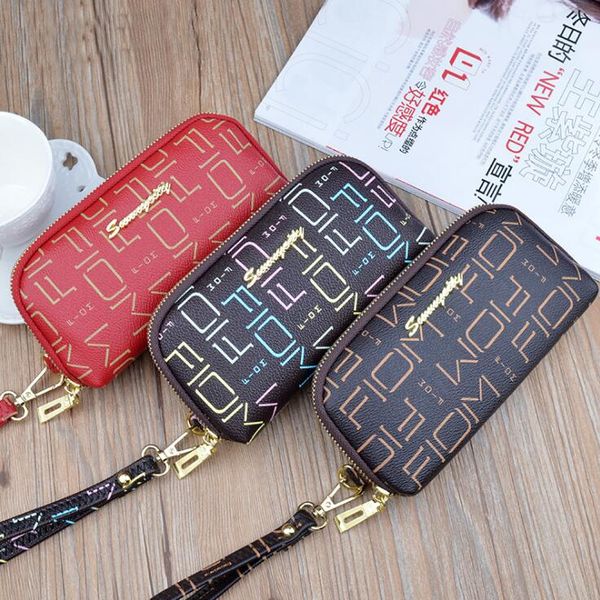factory wholesale women handbag printed womens hand purse elegant atmosphere shell long wallet trend contrast leather mobile phone bag, Red;black
factory wholesale women handbag printed womens hand purse elegant atmosphere shell long wallet trend contrast leather mobile phone bag, Red;black