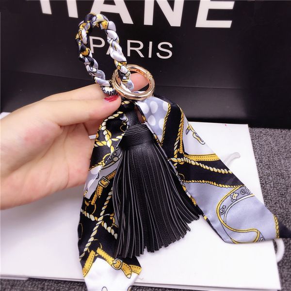 creative binding bag, silk scarf pendant, personalized pu leather tassel key chain, hanging decoration, fashion circle chain, Silver
creative binding bag, silk scarf pendant, personalized pu leather tassel key chain, hanging decoration, fashion circle chain, Silver