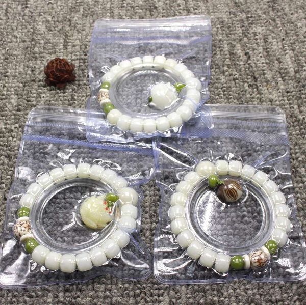 white jade bodhi vacuum packaging white root single ring with lotus bracelet child, Black
white jade bodhi vacuum packaging white root single ring with lotus bracelet child, Black