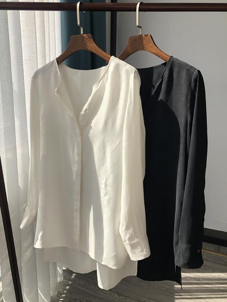 2021 New Nova Camisa De Viscose Feminina Assimetria Simples Manga Longa o Pescoo Aberto Placket Ladiescardigan Blusas Femininas e Topos Xp09, Black 
2021 New Nova Camisa De Viscose Feminina Assimetria Simples Manga Longa o Pescoo Aberto Placket Ladiescardigan Blusas Femininas e Topos Xp09, Black