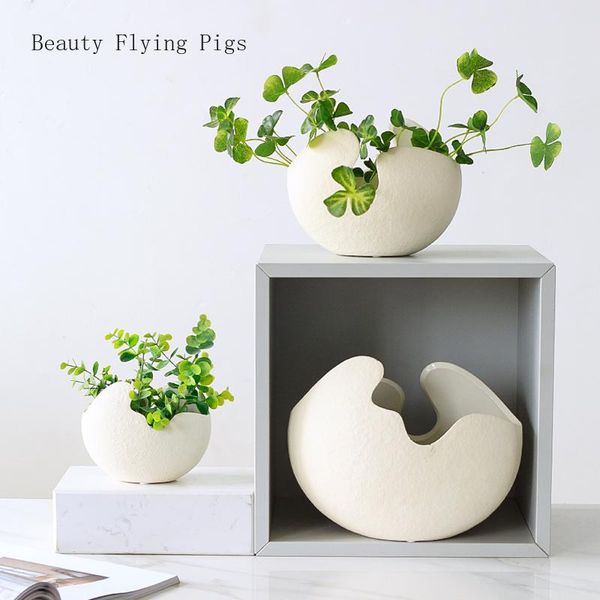 1pcs modern pastoral nordic style white ceramics egg shell vase flower pot home deskornaments flower arrangement decoration
1pcs modern pastoral nordic style white ceramics egg shell vase flower pot home deskornaments flower arrangement decoration