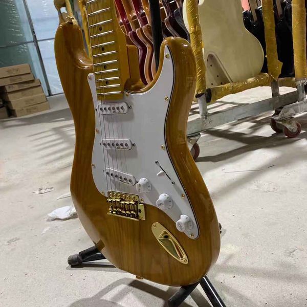 natural ash body st electric guitar tremolo bridge & whammy bar, gold hardware, white pickguard, sandwich neck
natural ash body st electric guitar tremolo bridge & whammy bar, gold hardware, white pickguard, sandwich neck