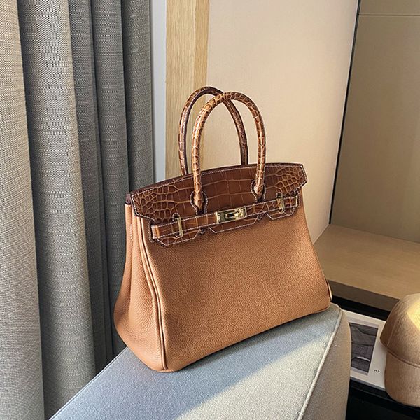 factory outlet design advanced sense leather women's crocodile pattern splicing head layer cowhide togo fashion one shoulder handbag
factory outlet design advanced sense leather women's crocodile pattern splicing head layer cowhide togo fashion one shoulder handbag