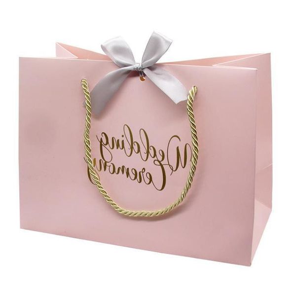 high-quality gifts bow gift bag portable paper bag wedding supplies tote wrapping paper bags with handle wholesale
high-quality gifts bow gift bag portable paper bag wedding supplies tote wrapping paper bags with handle wholesale