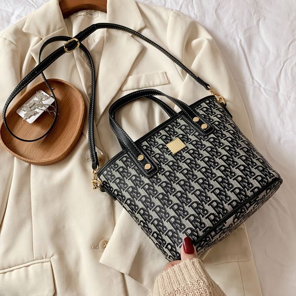 fashion bag new alphabet printed single shoulder women's messenger texture hand handbags premium
fashion bag new alphabet printed single shoulder women's messenger texture hand handbags premium