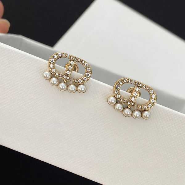 2021 newd / di home cd letter female brass pearl diamond earrings advanced fashion earrings-wholesale, Golden
2021 newd / di home cd letter female brass pearl diamond earrings advanced fashion earrings-wholesale, Golden