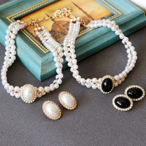 chains western medieval pearl necklace white black hepburn imitation silver needle earrings set cheongsam dress
chains western medieval pearl necklace white black hepburn imitation silver needle earrings set cheongsam dress
