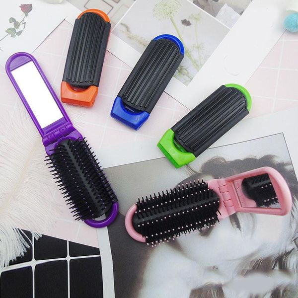 hair brushes 1pcs professional travel comb with mirror portable air cushion folding brush compact pocket size, Silver 
hair brushes 1pcs professional travel comb with mirror portable air cushion folding brush compact pocket size, Silver
