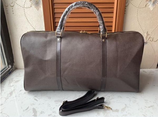 54cm large capacity women men duffel bag famous classical shoulder designer travel bags carry on luggage plain letter
54cm large capacity women men duffel bag famous classical shoulder designer travel bags carry on luggage plain letter
