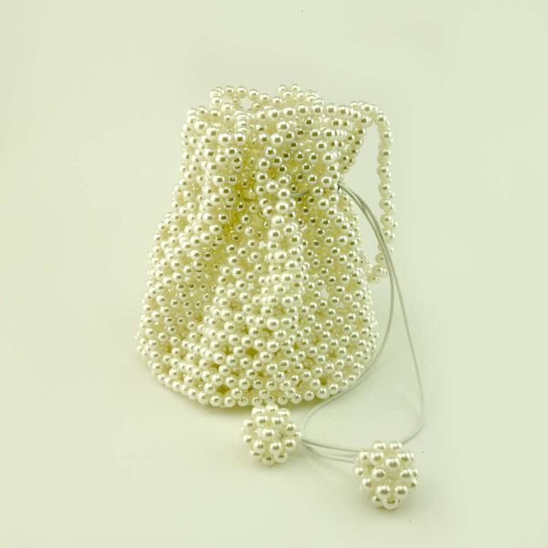 popular hand-made pearl beaded bags, drawstring barrel women's handbags, with inner bags
popular hand-made pearl beaded bags, drawstring barrel women's handbags, with inner bags