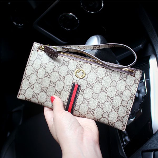 2021 fashion new women's large capacity printed hand zero wallet mobile phone card bag, Red;black
2021 fashion new women's large capacity printed hand zero wallet mobile phone card bag, Red;black