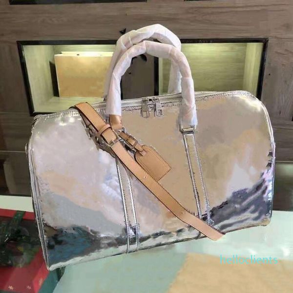 large capacity luggage travel bag silver embossed handbag boston men women duffle bags
large capacity luggage travel bag silver embossed handbag boston men women duffle bags