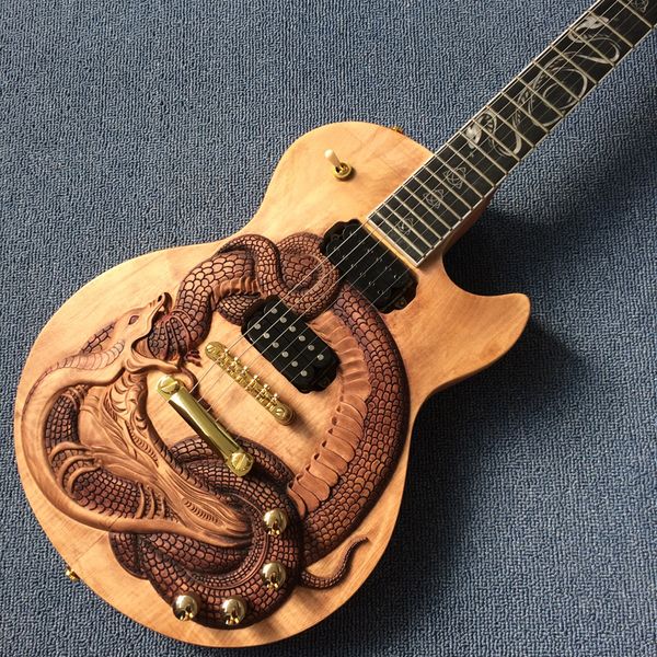 custom shop guitar mahogany body & neck,maple panel dragon carving,rosewood fingerboard,gold hardware,170928
custom shop guitar mahogany body & neck,maple panel dragon carving,rosewood fingerboard,gold hardware,170928