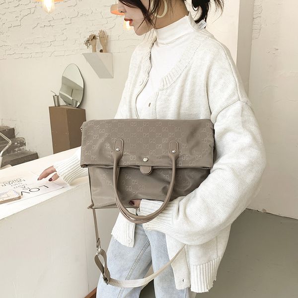 luxury designer women's bag new single shoulder waterproof oxford cloth large capacity travel bag messenger
luxury designer women's bag new single shoulder waterproof oxford cloth large capacity travel bag messenger