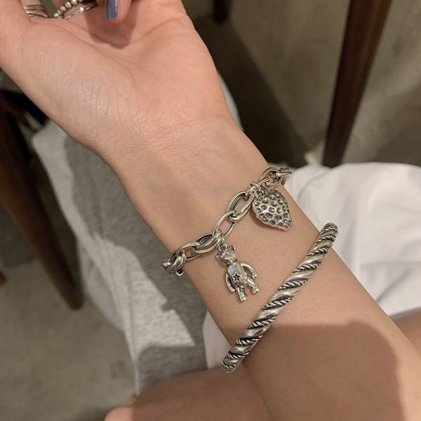 925 sterling silver lovely strawberry bear bracelet braided with twist bracelet, Black
925 sterling silver lovely strawberry bear bracelet braided with twist bracelet, Black