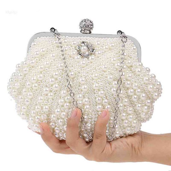 luxury pearl shell design women bags beaded handmade diamonds chan shoulder messenger crystal wedding evening bag
luxury pearl shell design women bags beaded handmade diamonds chan shoulder messenger crystal wedding evening bag